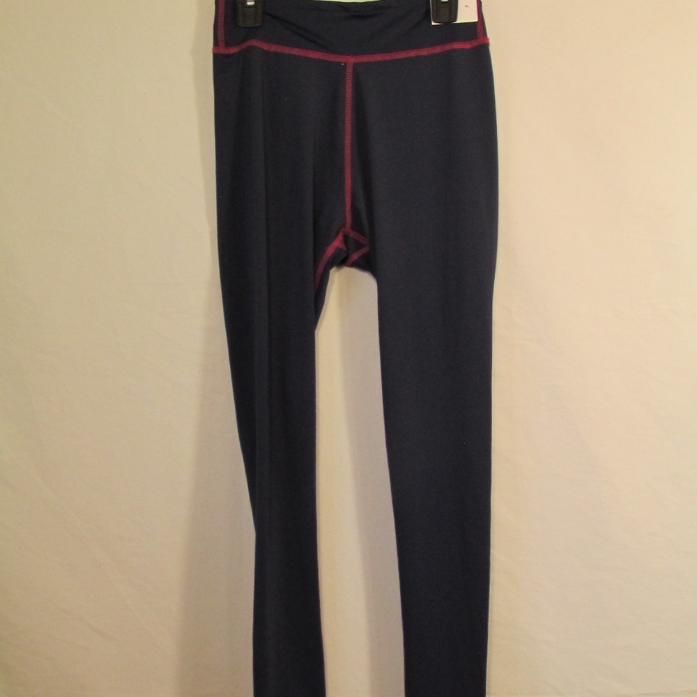 Born Outdoor Women's Base Layer Leggings in a navy and pink colorway